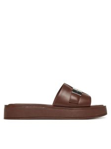 Calvin Klein Klapki Flatform Slide W/Ck Hw - Lth HW0HW02368 Brązowy. Brązowe klapki Calvin Klein, bez wzorów, ze skóry, bez obcasa. Za 329,99 zł.