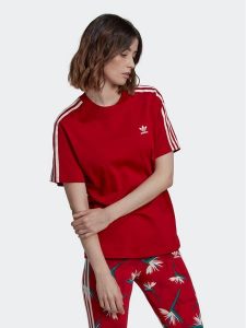 Adidas T-Shirt THEBE MAGUGU HK5209 Czerwony Regular Fit. Czerwone t-shirty ADIDAS, bez wzorów, z bawełny, bez kołnierzyka, bez ramiączek. Za 99,99 zł.