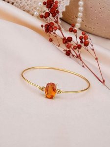 Pierres delicates Pozłacana bransoletka z zultanitem rozmiar: onesize. Pomarańczowe bransoletki Pierres delicates, pozłacane. Za 42,95 zł.