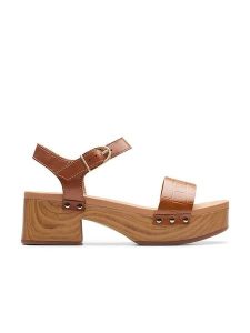 Clarks Skórzane sandały "Sivanne Bay" w kolorze jasnobrązowym na obcasie rozmiar: 37. Brązowe sandały Clarks, bez wzorów, z otwartym noskiem, bez obcasa, na koturnie, bez zapięcia. Za 186,19 zł.