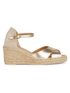 Geox Skórzane sandały "Gelsa" w kolorze złotym rozmiar: 38. Żółte sandały Geox, bez wzorów, z materiału, z otwartym noskiem, bez obcasa, na koturnie, bez zapięcia. Za 217,99 zł.