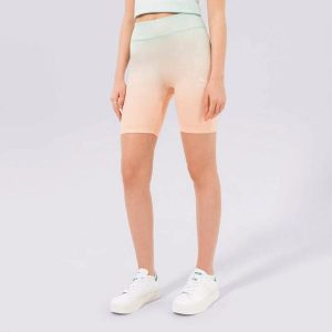 PUMA LEGGINSY KOLARKI DAMSKIE PUMA-SZORTY 845842 PRZED KOLANO KOLOR RÓŻOWY. Czerwone legginsy Puma, bez wzorów, z materiału, krótkie. Za 117,10 zł.
