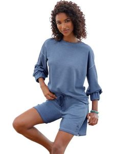 Heine Bluza w kolorze niebieskim rozmiar: 38. Niebieskie bluzy Heine, bez wzorów, bez kaptura. Za 77,95 zł.
