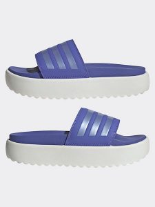 Adidas Klapki w kolorze fioletowo-białym rozmiar: 40,5. Różowe klapki ADIDAS, bez wzorów, z otwartym noskiem, bez obcasa. Za 171,28 zł.