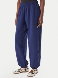 Adidas Spodnie dresowe Soft Lux KS7879 Niebieski Loose Fit. Niebieskie spodnie dresowe ADIDAS, xs, bez wzorów, z dresówki. Za 329,99 zł.