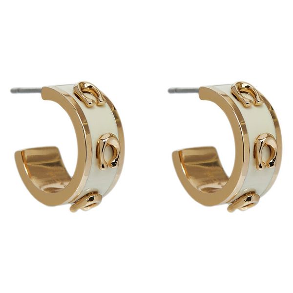 Kolczyki Coach. Żółte kolczyki Coach, złote. Za 229,99 zł.