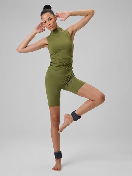 4F Legginsy kolarki do jogi damskie - oliwkowe M. Brązowe legginsy 4f, bez wzorów, z włókna, z podwyższonym stanem. Za 129,99 zł.