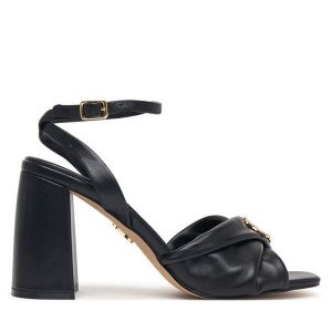 Sandały Steve Madden. Czarne sandały Steve Madden, bez wzorów, bez obcasa, na słupku, bez zapięcia. Za 519,99 zł.