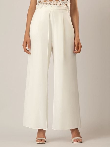 APART Spodnie w kolorze kremowym rozmiar: 42. Brązowe spodnie z wysokim stanem Apart, bez wzorów, z materiału, z podwyższonym stanem. Za 219,60 zł.