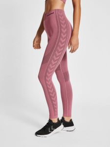 Damskie legginsy mid-rise Hummel Shaping. Brązowe legginsy Hummel, bez wzorów, z dzianiny. Za 175,50 zł.