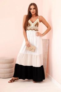 Sukienka damska boho maxi na ramiączkach z ażurową górą beżowy + czarny. Brązowe sukienki Kesi Włoski, na plażę, na lato, l, w ażurowe wzory, z bawełny, boho, bez kołnierzyka, bez ramiączek, maxi, rozkloszowane. Za 217,48 zł.
