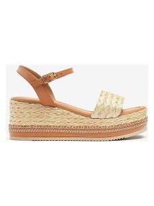 Unisa Sandały w kolorze jasnobrązowo-beżowym na koturnie rozmiar: 41. Brązowe sandały Unisa, bez wzorów, z materiału, z otwartym noskiem, bez obcasa, na koturnie, bez zapięcia. Za 260,99 zł.