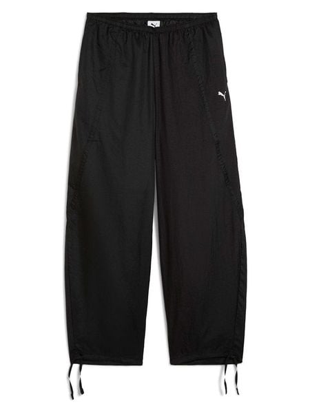 Puma Spodnie dresowe "Dare To" w kolorze czarnym rozmiar: M. Czarne spodnie dresowe Puma, m, bez wzorów, z dresówki. Za 135,17 zł.