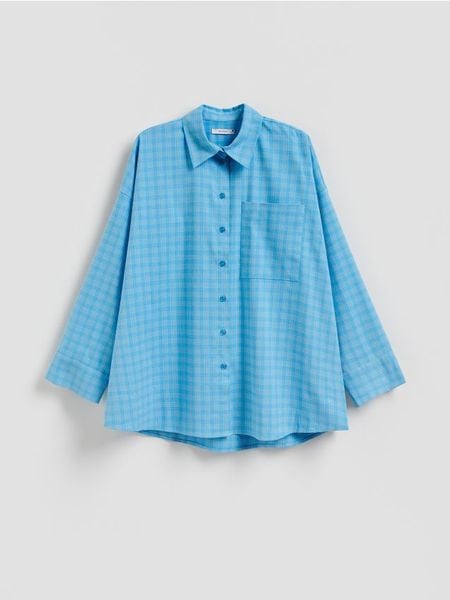 Koszula oversize - jasnoniebieski. Niebieskie koszule Reserved, l, bez wzorów, z tkaniny, bez kołnierzyka, bez ramiączek. Za 159,99 zł.