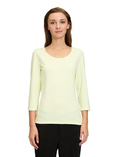 CARTOON Koszulka w kolorze żółtym rozmiar: 38. Żółte bluzki Cartoon, bez wzorów, bez kołnierzyka, bez ramiączek. Za 39,99 zł.