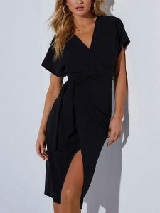 Milan Kiss Sukienka w kolorze czarnym rozmiar: M. Czarne sukienki Milan Kiss, m, bez wzorów, bez kołnierzyka, bez ramiączek, midi. Za 130,50 zł.