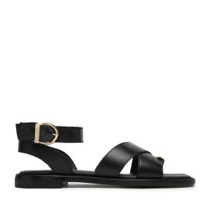 Sandały Beverly Hills Polo Club. Czarne sandały Beverly Hills Polo Club, bez wzorów, bez obcasa, na płaskiej podeszwie, bez zapięcia. Za 299,99 zł.