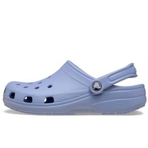 Klapki Crocs Classic Sabot U Dorośli. Niebieskie klapki Crocs, bez wzorów, z materiału, bez obcasa. Za 259,99 zł.