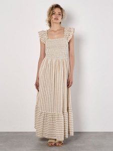 Apricot Sukienka w kolorze beżowym rozmiar: L. Brązowe sukienki Apricot, l, bez wzorów, bez kołnierzyka, bez ramiączek, maxi. Za 114,17 zł.