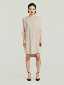 G-Star Sukienka w kolorze kremowym rozmiar: XS. Brązowe sukienki G-Star, na co dzień, xs, bez wzorów, z bawełny, retro, bez kołnierzyka, bez ramiączek, midi, proste. Za 121,99 zł.