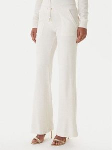 Juicy Couture Spodnie dresowe Layla JCSEBJ001G Beżowy Regular Fit. Brązowe spodnie dresowe Juicy Couture, xl, bez wzorów, z dresówki. Za 349,99 zł.