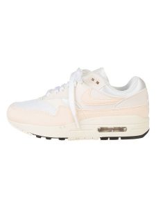 Nike Skórzane sneakersy "Air Max 1" w kolorze kremowo-jasnoróżowym rozmiar: 36. Brązowe trampki Nike, bez wzorów, z materiału, bez zapięcia. Za 440,28 zł.