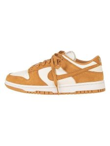 Nike Sneakersy "Dunk Low Next Nature" w kolorze kremowo-żółtym rozmiar: 41. Żółte trampki Nike, bez wzorów, bez zapięcia. Za 343,41 zł.