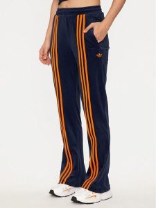 Adidas Spodnie dresowe Velour JN8290 Granatowy Regular Fit. Niebieskie spodnie dresowe ADIDAS, xl, bez wzorów, z dresówki. Za 299,99 zł.