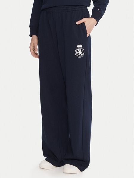 Tommy Hilfiger Spodnie dresowe UW0UW06081 Granatowy Wide Leg. Niebieskie spodnie dresowe TOMMY HILFIGER, s, bez wzorów, z bawełny. Za 239,99 zł.