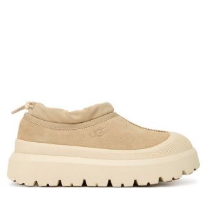 Śniegowce Ugg. Brązowe buty zimowe Ugg, bez obcasa, bez zapięcia. Za 749,99 zł.