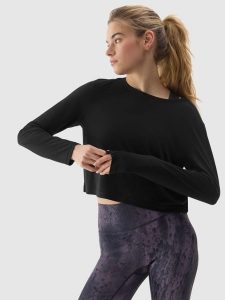 4F Longsleeve crop-top do jogi z dodatkiem modalu damski - czarny M. Czarne topy 4f, m, bez wzorów, z dzianiny, bez kołnierzyka, bez ramiączek. W wyprzedaży za 29,99 zł.