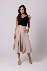 Rozkloszowana spódnica z wysokim stanem i kieszeniami beż. Spódnice Bewear, na lato, xl, bez wzorów, midi. Za 319,00 zł.