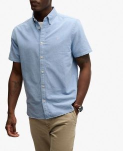 Superdry Koszula Preppy Oxford krótki rękaw Sky Blue Chambray. Niebieskie koszule Superdry, l, bez wzorów, z bawełny, bez kołnierzyka, bez ramiączek. Za 245,20 zł.