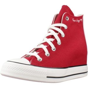 Buty CONVERSE CHUCK TAYLOR ALL STAR WEDGE Bordeaux. Czerwone trampki Converse, bez wzorów, z tkaniny, bez zapięcia. Za 387,99 zł.