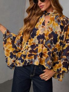 Milan Kiss Bluzka w kolorze żółtym rozmiar: XL. Żółte bluzki Milan Kiss, xl, bez wzorów, bez kołnierzyka, bez ramiączek. Za 152,99 zł.