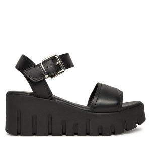 Sandały Tamaris. Czarne sandały Tamaris, bez wzorów, bez obcasa, na koturnie, bez zapięcia. Za 299,99 zł.