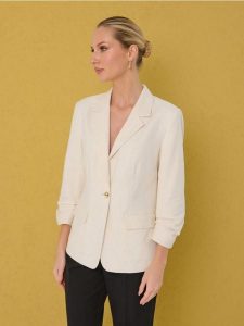 Marynarka z domieszką lnu - kremowy. Białe marynarki i żakiety Sinsay, l, bez wzorów. Za 69,99 zł.