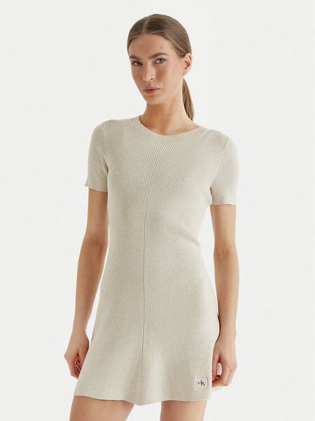 Calvin Klein Jeans Sukienka dzianinowa LV047F325G Beżowy Slim Fit. Brązowe kombinezony Calvin Klein Jeans, l, bez wzorów, z bawełny, bez kołnierzyka, bez ramiączek. Za 489,99 zł.