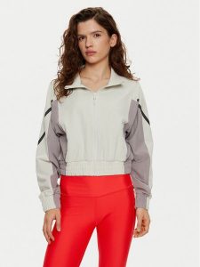 Under Armour Wiatrówka UA Unstoppable Crop 1386479 Écru Regular Fit. Kurtki Under Armour, s, bez wzorów, z syntetyku, bez kaptura. Za 269,99 zł.