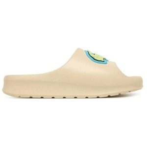 Klapki damskie Lacoste Serve Slide 2.0. Białe klapki Lacoste, bez wzorów, z dresówki, bez obcasa. Za 233,20 zł.