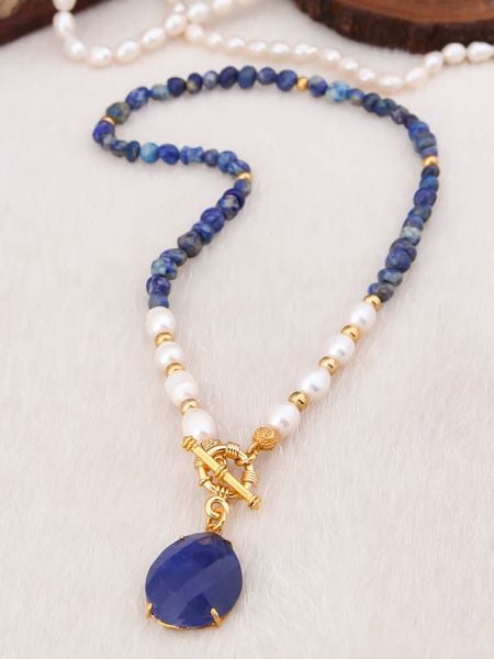 L'Atelier de Gaia Pozłacany naszyjnik z elementami ozdobnymi - dł. 50 cm rozmiar: onesize. Białe naszyjniki L'Atelier de Gaia, z perłą, pozłacane. Za 100,45 zł.