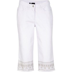 Dżinsy rybaczki z haftem. Niebieskie jeansy bonprix, bez wzorów, z jeansu. Za 129,99 zł.