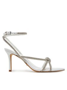 Guess Sandały FLJMRT ELE03 Biały. Białe sandały Guess, z aplikacjami, ze skóry, bez obcasa, na szpilce, bez zapięcia. Za 449,99 zł.