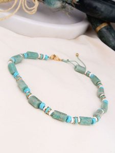 Charlize Pozłacany naszyjnik z kamieniami szlachetnymi - dł. 45 cm rozmiar: onesize. Niebieskie naszyjniki Charlize, z jaspisem, pozłacane. Za 96,14 zł.