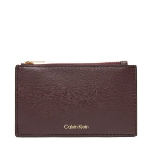 Portfel Calvin Klein. Czerwone portfele Calvin Klein, bez wzorów. Za 179,99 zł.