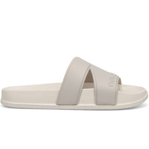 Klapki damskie New Balance SUF20SU3 – beżowe. Brązowe klapki New Balance, bez wzorów, bez obcasa. Za 69,99 zł.