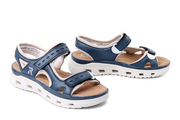 RIEKER 64066-14 blue combination, sandały damskie. Niebieskie sandały Rieker, bez wzorów, bez obcasa, bez zapięcia. Za 271,92 zł.