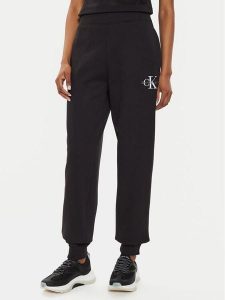Calvin Klein Jeans Spodnie dresowe Monologo J20J223590 Czarny Relaxed Fit. Czarne spodnie dresowe Calvin Klein Jeans, m, bez wzorów, z bawełny. Za 229,99 zł.