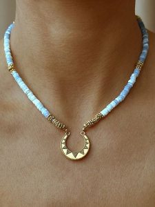 Taboo Pozłacany naszyjnik z elementem ozdobnym - dł. 40 cm rozmiar: onesize. Niebieskie naszyjniki Taboo, z opalem, pozłacane. Za 208,99 zł.