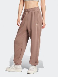 Adidas Spodnie dresowe w kolorze beżowym rozmiar: M. Brązowe spodnie dresowe ADIDAS, m, bez wzorów, z dresówki. Za 149,66 zł.